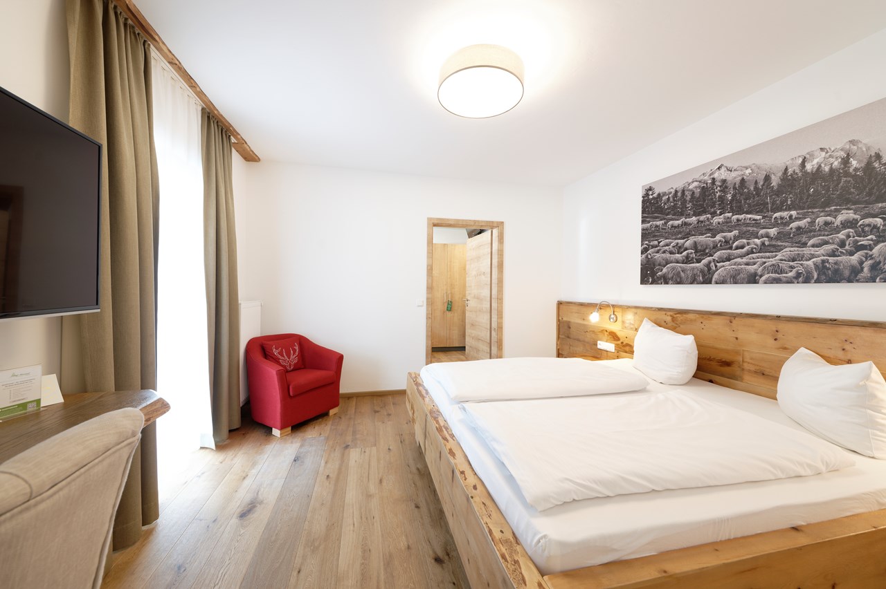 Hotel Garni Alpengruß Zimmerkategorien Vierbettzimmer mi Dachterrasse